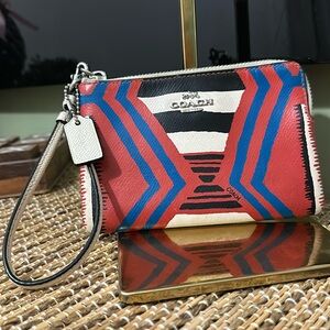 Coach tribal let’s dance wristlet